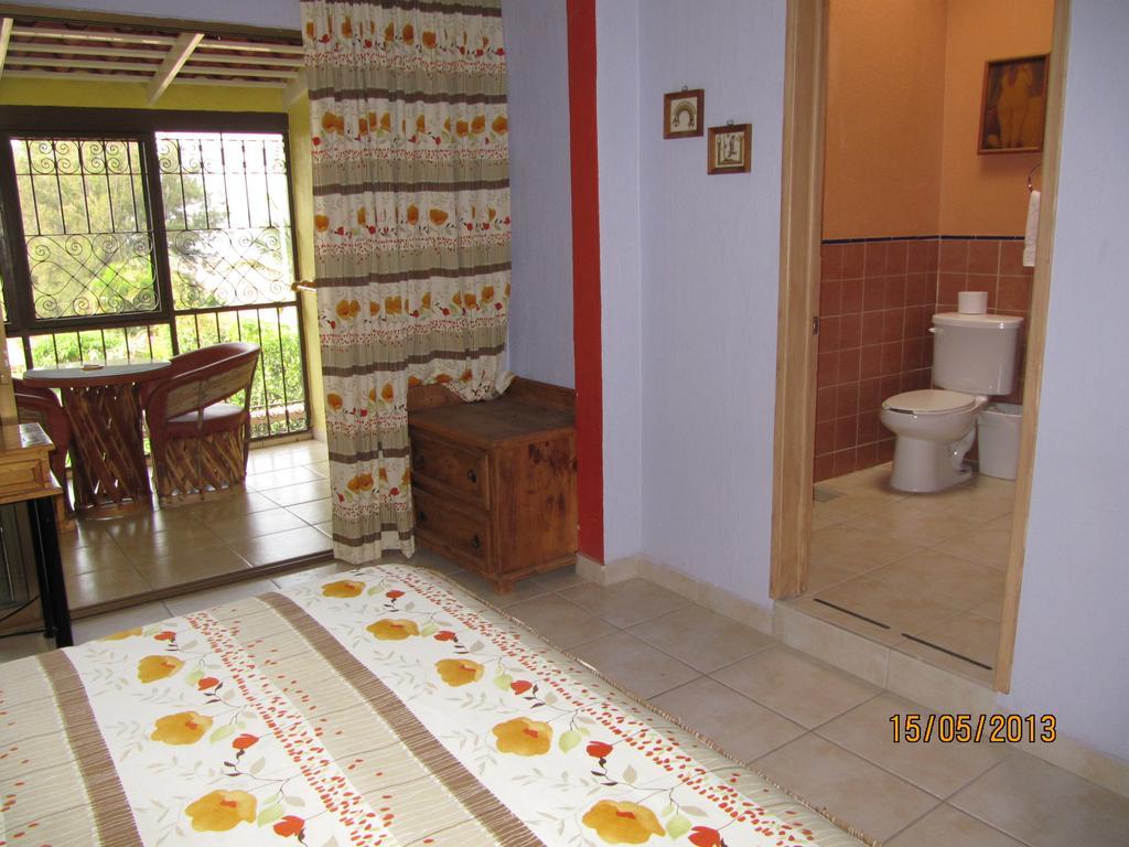 La Puerta Violeta Guesthouse & Spa San Juan Cosalá Pokoj fotografie